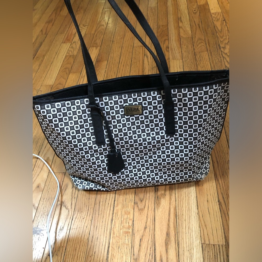 Vera New York geometric patterned tote bag featuring a metallic brand logo plate